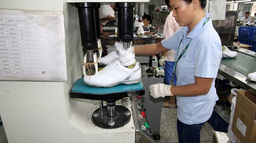 Golf shoe lasting in our factory